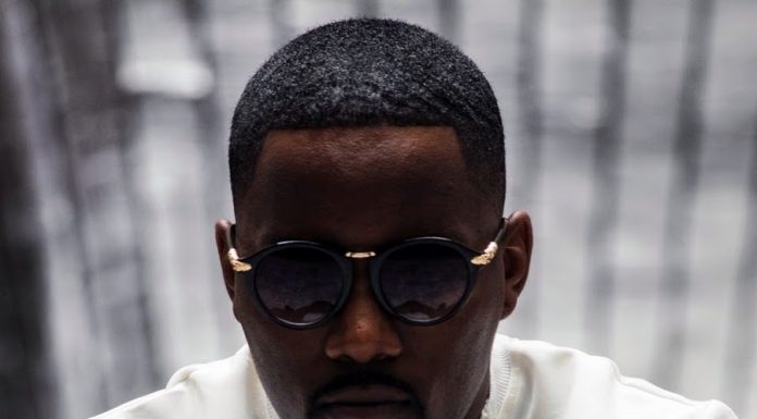 Tay Grin shoots the upcoming Elli Njuchi in the arm